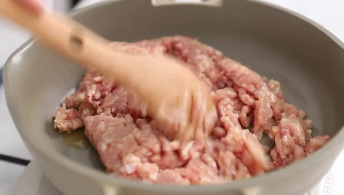 Add ground chicken (or turkey) and brown until almost cooked through.