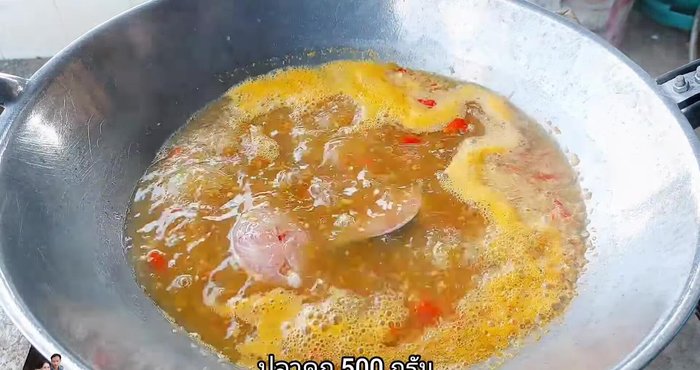Bring to a boil, then add the catfish. Do not stir immediately.
