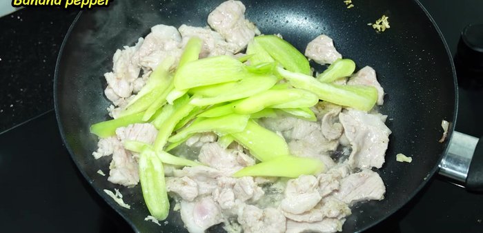 Add onions and stir-fry.