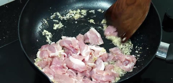 Add pork and stir-fry until mostly cooked.