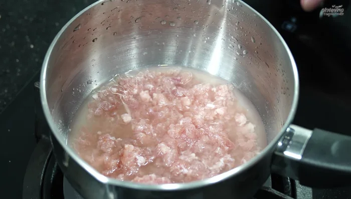 Stir-fry the pork: Once softened, turn on low heat and stir-fry until cooked through.