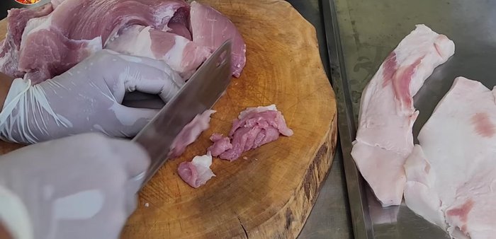 Prepare the pork: Slice the pork thinly. Avoid cutting too thinly, or it will burn during grilling.