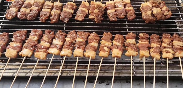 Grill the pork: Grill the marinated pork on medium heat for about 10 minutes, basting occasionally.