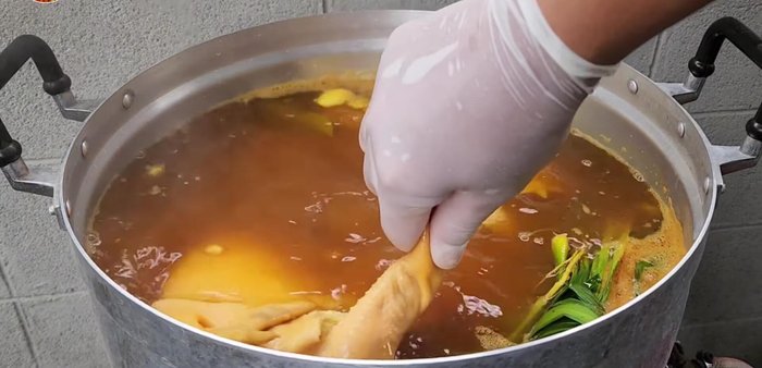 Blanch the chicken in hot water before adding it to the boiling mixture.