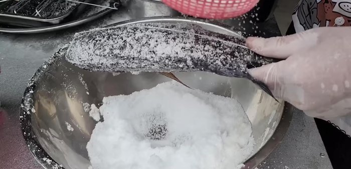 If grilling, optionally coat the fish with a mixture of all-purpose flour and salt to help the salt adhere better during cooking.