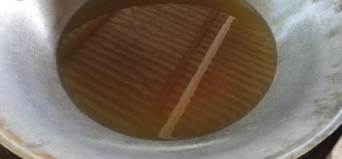 Separate and Soak: Separate any pieces that are sticking together, soak them in water, then fry again.