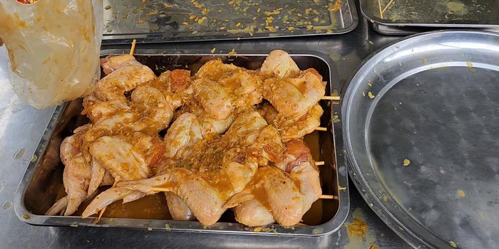 Pour remaining marinade over the chicken.