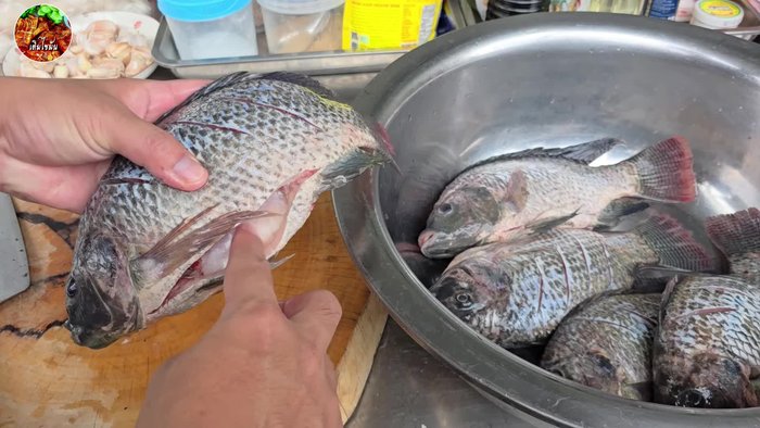 Clean and cut the tilapia into strips.