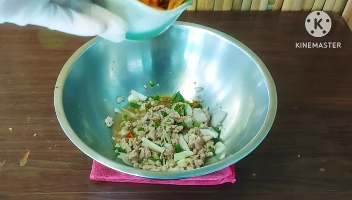 Add the roasted dried shrimp to the bowl and mix well.