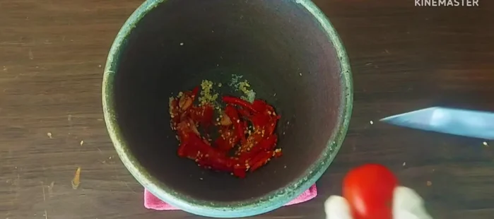 Add tomatoes (pound them slightly to release juice).