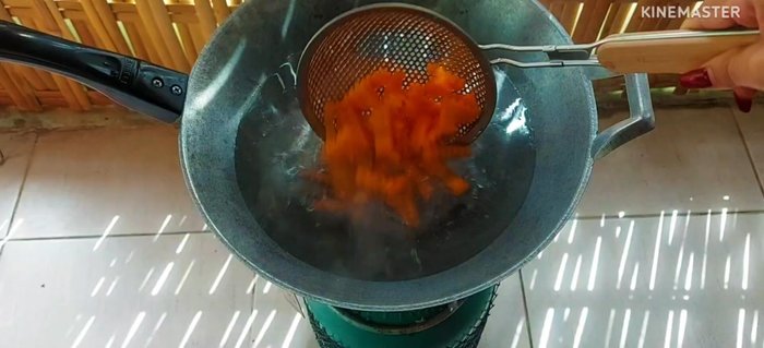 Boil the carrots until cooked, then shock them in cold water.