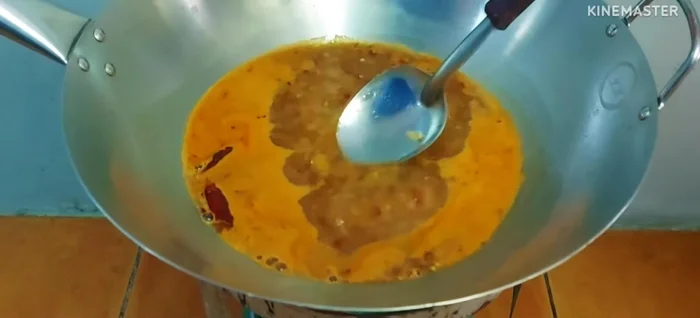 Simmer and season with sugar, MSG (optional), fish sauce, and tamarind juice.