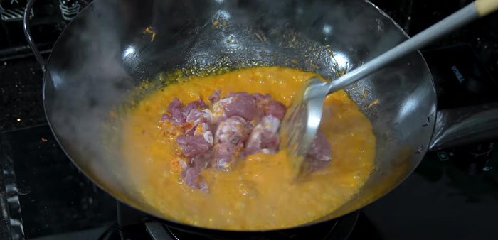 Add the sliced pork and stir-fry until partially cooked.
