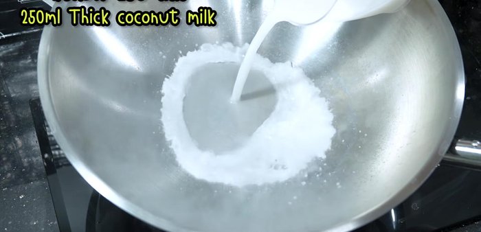 Heat the pan, add coconut milk, and simmer until thickened.