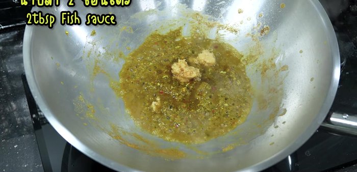 Season with palm sugar, fish sauce, and chicken seasoning powder. Stir-fry until the sugar dissolves.