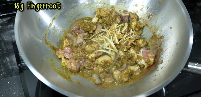 Add galangal and torn kaffir lime leaves to enhance aroma and remove any meaty smell.