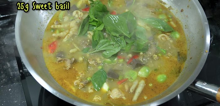 Add betel leaves and simmer until everything is cooked thoroughly.