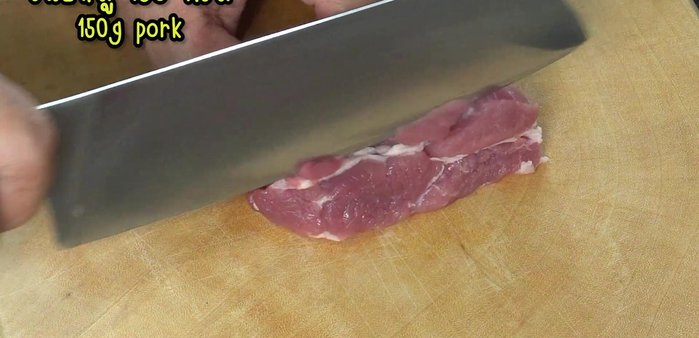 Cut pork shoulder into thin slices. Refrigerate for 30-40 minutes if needed for easier cutting.