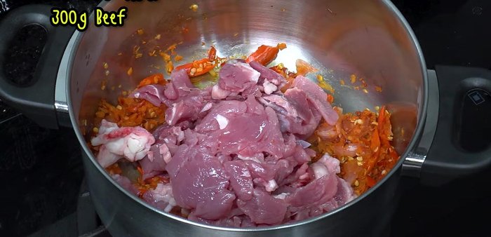 Add the beef and stir-fry until it's about 80-90% cooked.