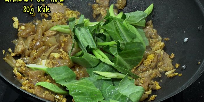 Add kale and stir-fry until cooked (crispy or soft, depending on preference).