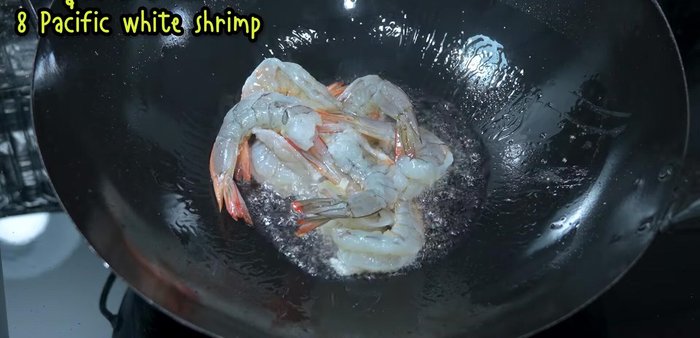 Stir-fry the shrimp until cooked through, but not overcooked (208.76). Remove the shrimp and set aside (253.519).