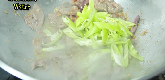 Add the reserved water from washing the mortar and pestle.