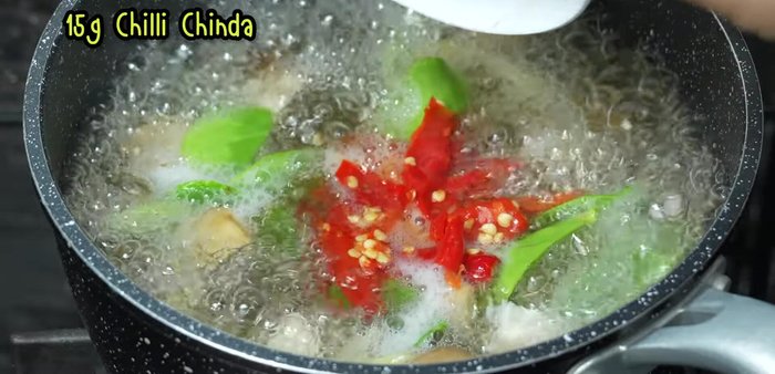 Add chili peppers and bring to a boil.