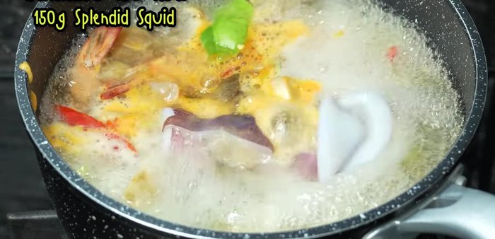 Add squid and cook until tender.