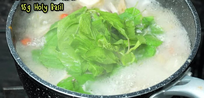 Add basil leaves and cook briefly.