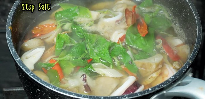 Season with fish sauce, salt, and lemon juice to taste.