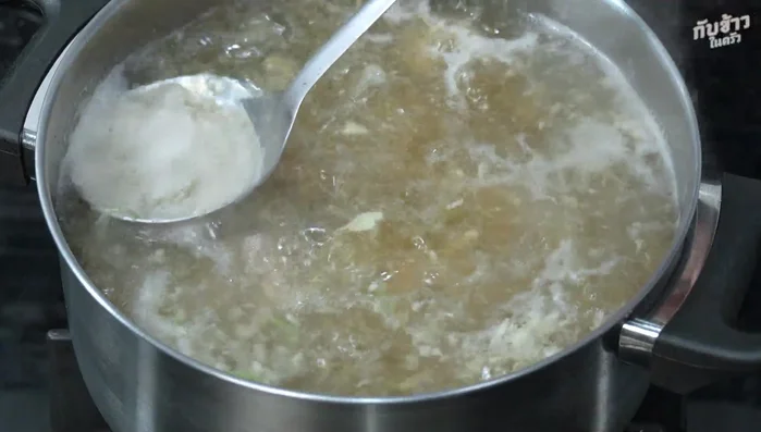 Skim off any foam or impurities that rise to the surface while the soup boils.