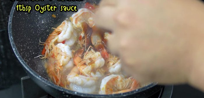 Season: Add white soy sauce, oyster sauce, and sugar; stir-fry until well combined.