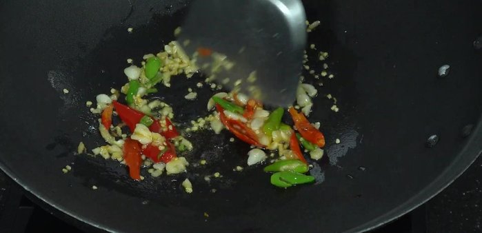 Stir-fry until fragrant and slightly yellow. Use medium heat to avoid burning.