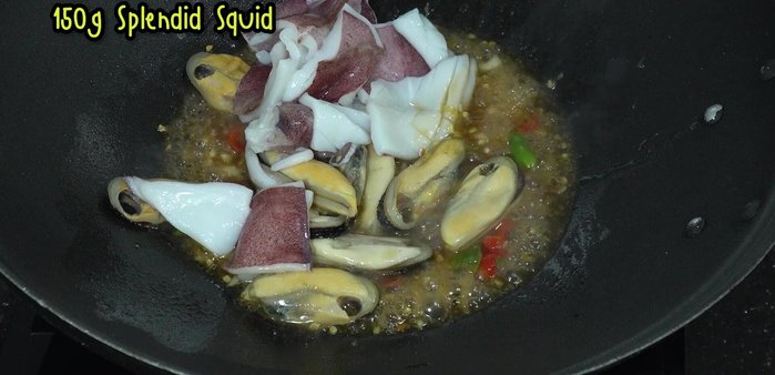 Add sliced squid.