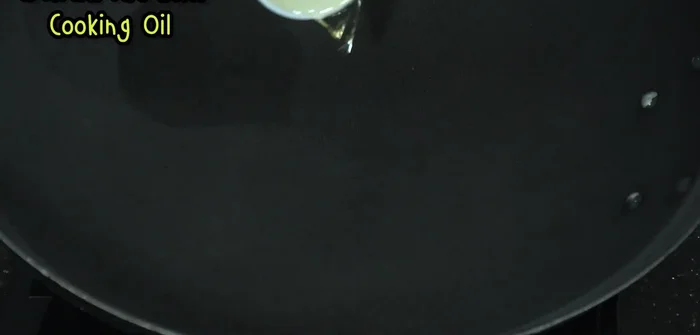 Heat oil in a pan.