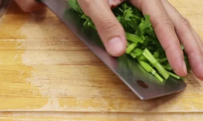Add garlic and other seasonings. Stir-fry until fragrant.