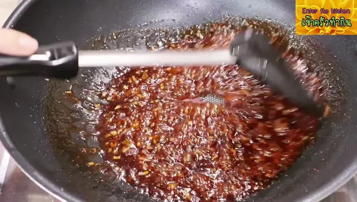 Add the noodles and stir-fry until heated through.