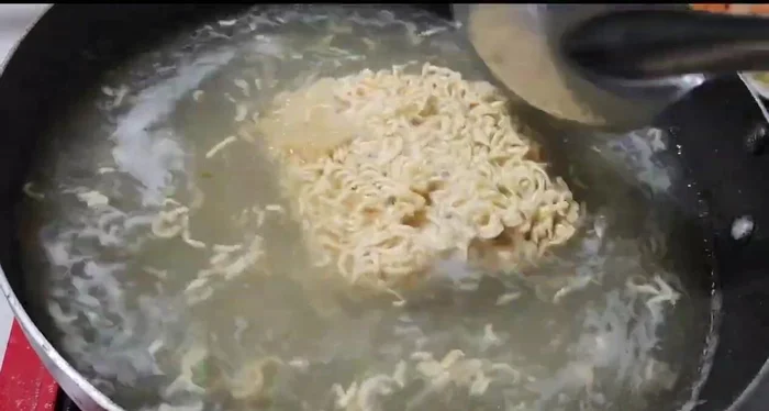 Cook the instant noodles according to package directions.