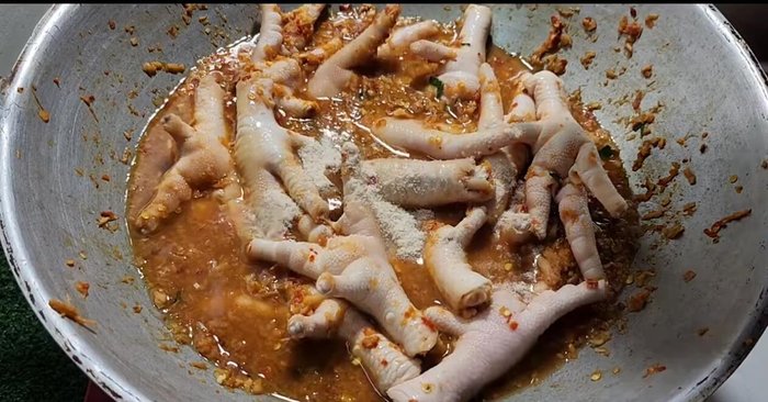 Season with fish sauce and chicken flavored flour powder (add MSG if desired).