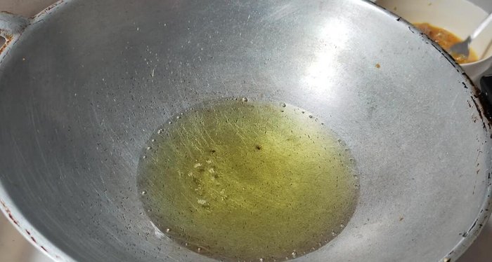 Pour the egg mixture into the hot pan.