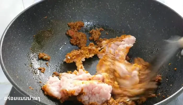 Add minced pork and stir-fry until cooked. Add a little water if needed.