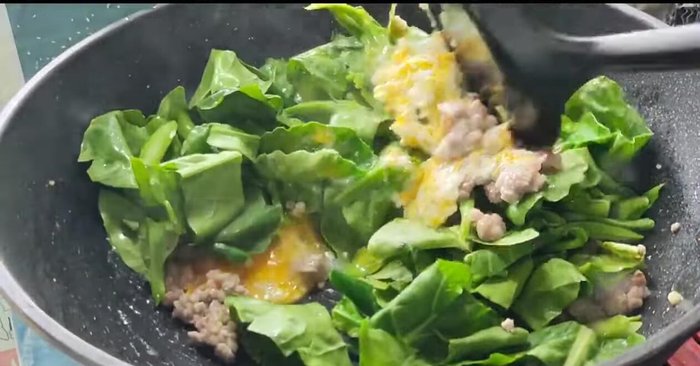 Add kale and stir-fry until cooked.