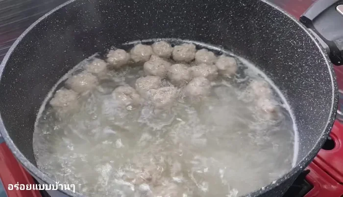 Add the clear soup stock, dried shrimp, light soy sauce, and sugar. Mix well.