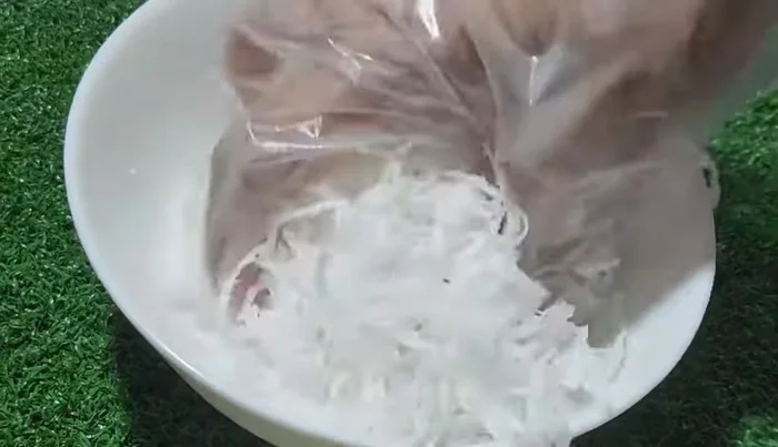 Add a pinch of salt and mix until the coconut is salty.