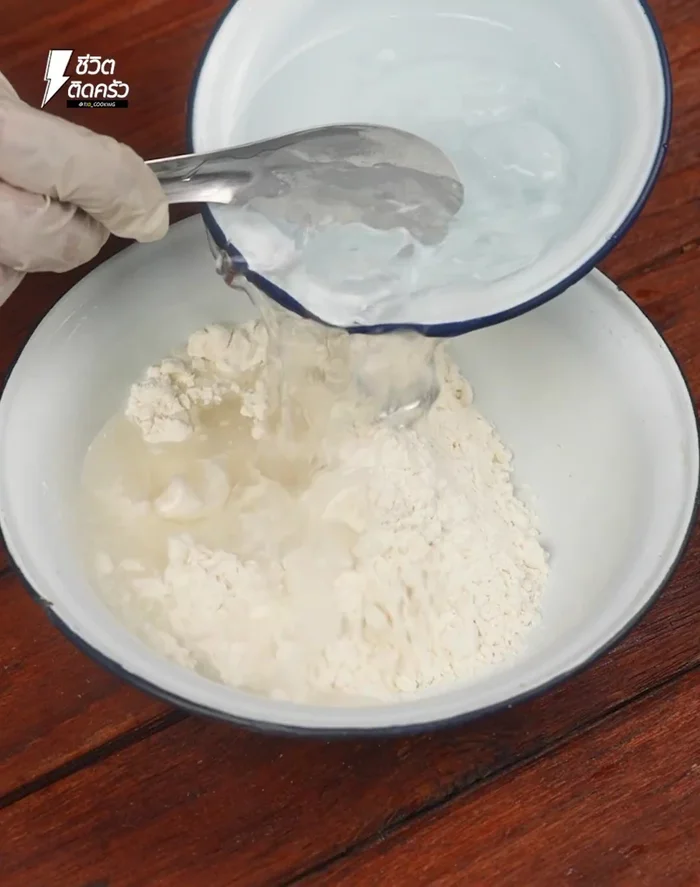Prepare the batter: Mix flour with cold water until liquidy but not sticky. (103.04)
