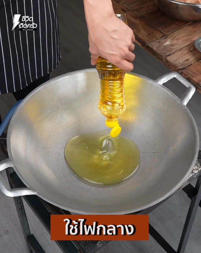Fry the pork: Heat oil in a pan. Add the marinated pork, ensuring it's spread evenly. Fry until cooked through and golden brown, achieving a crispy exterior and juicy interior.