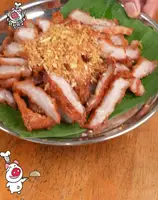 Crispy Fried Pork Neck with Spicy Jaew Dipping Sauce