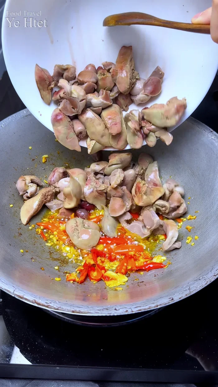 Optionally, blanch the chicken livers in boiling water for 15-30 seconds, then add the liver and glutinous rice flour mixture. Cook until just done.