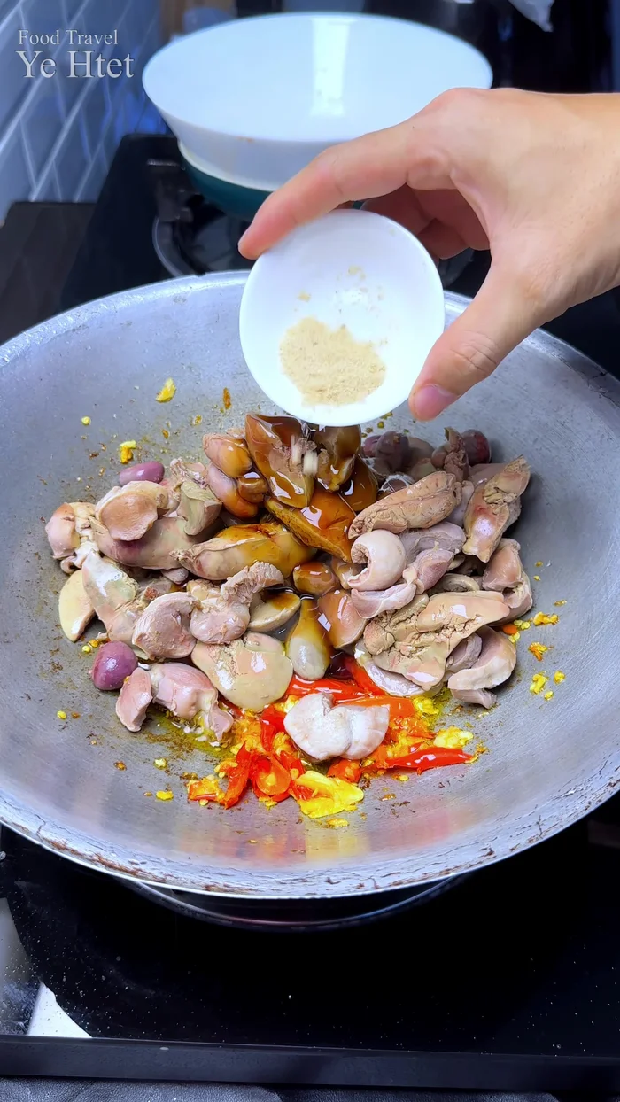 Add chopped onion, ginger (optional), and dried chilies (optional).