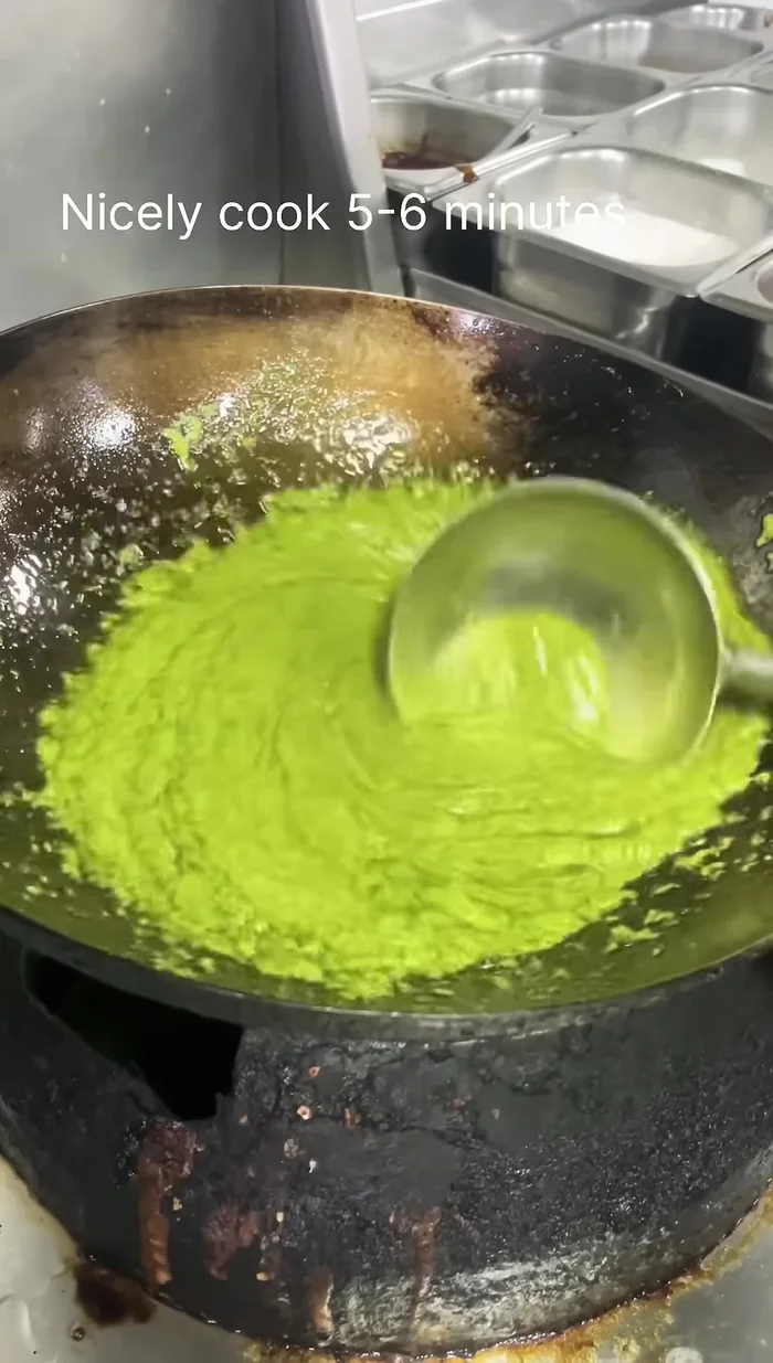 Once cooked (it will turn green), transfer the mixture to a bowl and marinate. Freeze for 2-3 hours.
